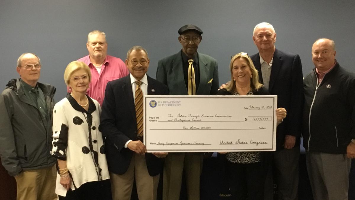 Congressman Bishop presents a ceremonial “big check” in Dawson, GA, representing the $1,000,000 he secured in federal funds for a workforce training program operated by the Golden Triangle Resources Conservation and Development Council.
