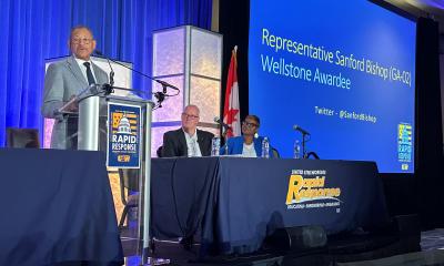 Congressman Bishop accepts the 2023 Paul Wellstone Award from the United Steelworkers