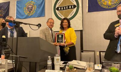 NASCOE President Marcinda Kester presents Congressman Bishop with NASCOE's Legislator of the Year award