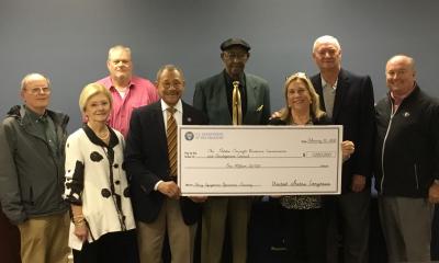 Congressman Bishop presents a ceremonial “big check” in Dawson, GA, representing the $1,000,000 he secured in federal funds for a workforce training program operated by the Golden Triangle Resources Conservation and Development Council.