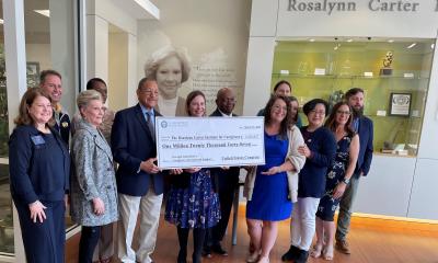 Congressman Bishop presents a ceremonial “big check” in Americus, GA, to the Rosalynn Carter Institute which represents the $1,020,047 the Congressman secured in federal funds to help RCI improve Alzheimer’s caregiving.