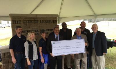 Congressman Bishop presents a ceremonial “big check” in Leesburg, GA, to Mayor Billy Breeden representing the $949,146 he secured in federal funds for the city’s clean water infrastructure development that will support a recreational complex project.