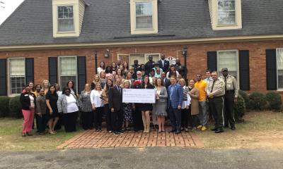 Congressman Bishop presents a ceremonial “big check” in Americus, GA, representing the $367,362 he secured in federal funds for the Southwest Georgia Children’s Alliance, Inc. to support its child abuse treatment and prevention program.
