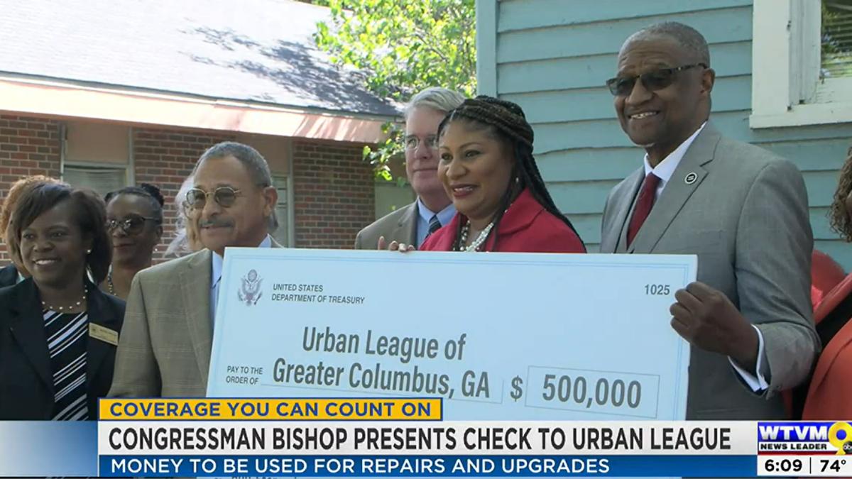 Congressman Bishop presents a FY22 Community Project Funding "big check" to the Urban League of Greater Columbus