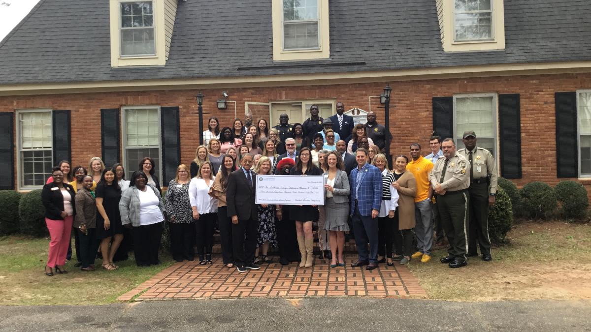 Congressman Bishop presents a ceremonial “big check” in Americus, GA, representing the $367,362 he secured in federal funds for the Southwest Georgia Children’s Alliance, Inc. to support its child abuse treatment and prevention program.